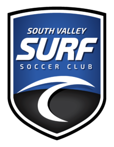 Blue shield logo for South Valley Surf Soccer Club with white border and wave motif.
