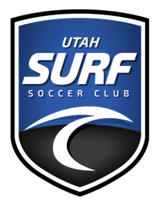 Utah Soccer Club crest on blue shield with white border and stylized white letters 'UTAH SOCCER CLUB' at top.
