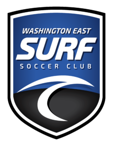 Blue shield logo for Washington East Surf Soccer Club with bold white 'SURF' text and curved white accents on a dark blue gradient background, outlined in white edge.